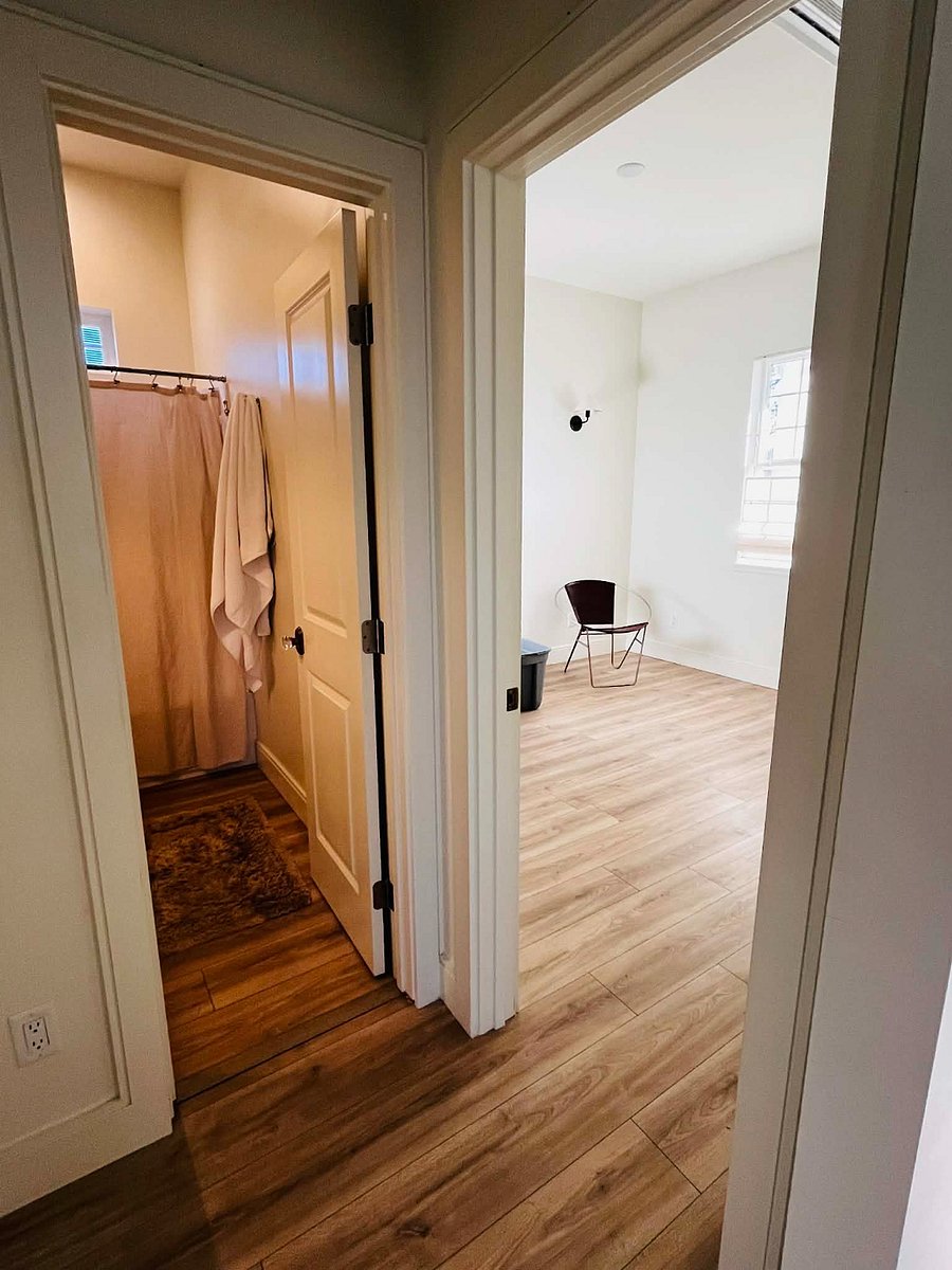 Private bedroom and bathroom are next to each other.