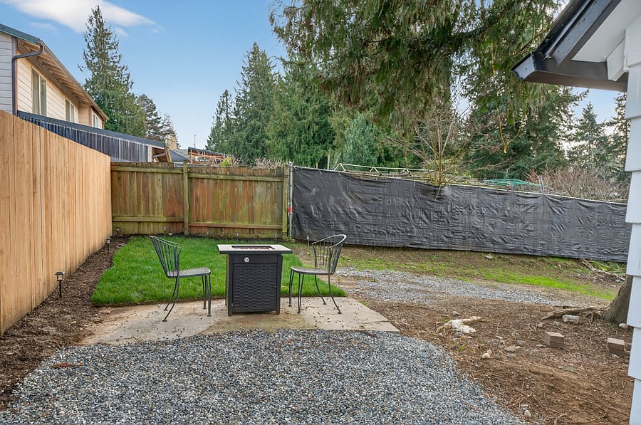 Cozy outdoor seating with a gas fire feature