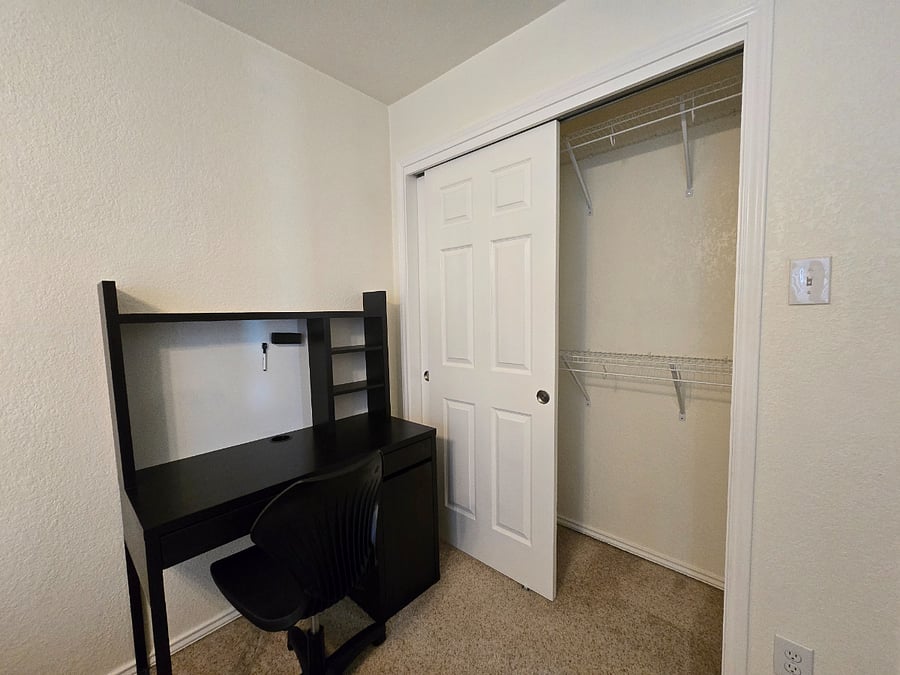 Bedroom with shared bathroom