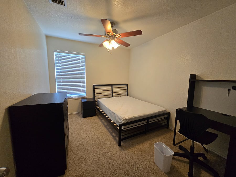 Bedroom with shared bathroom