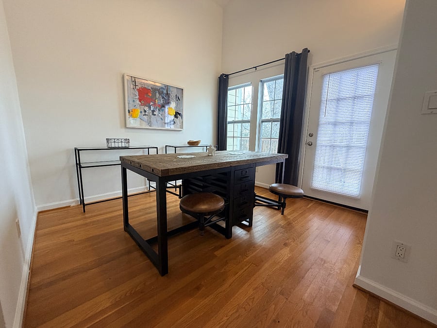 dining room with vaulted ceiling