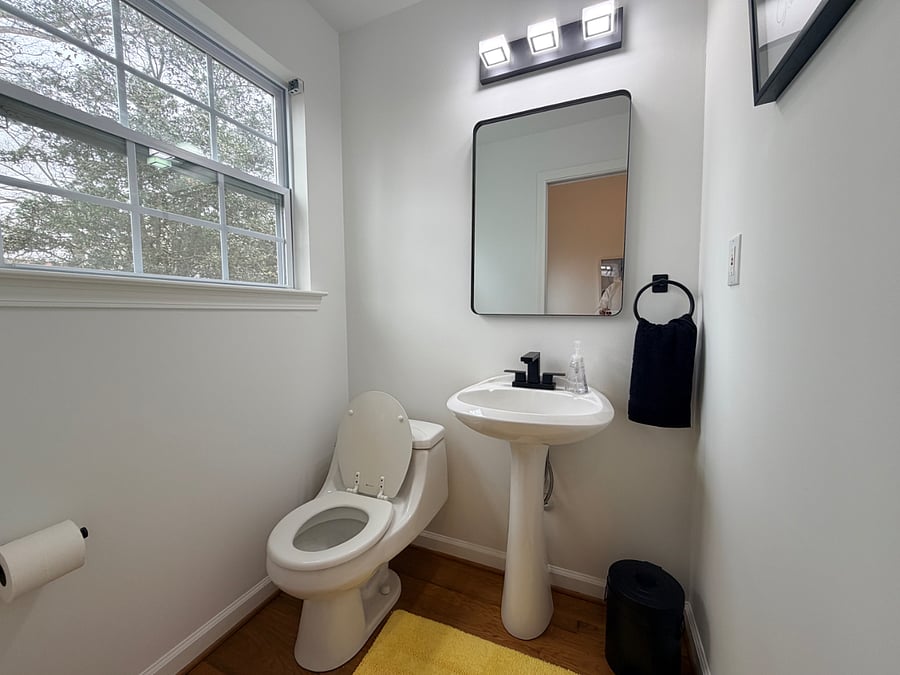 Newly renovated half bath by kitchen