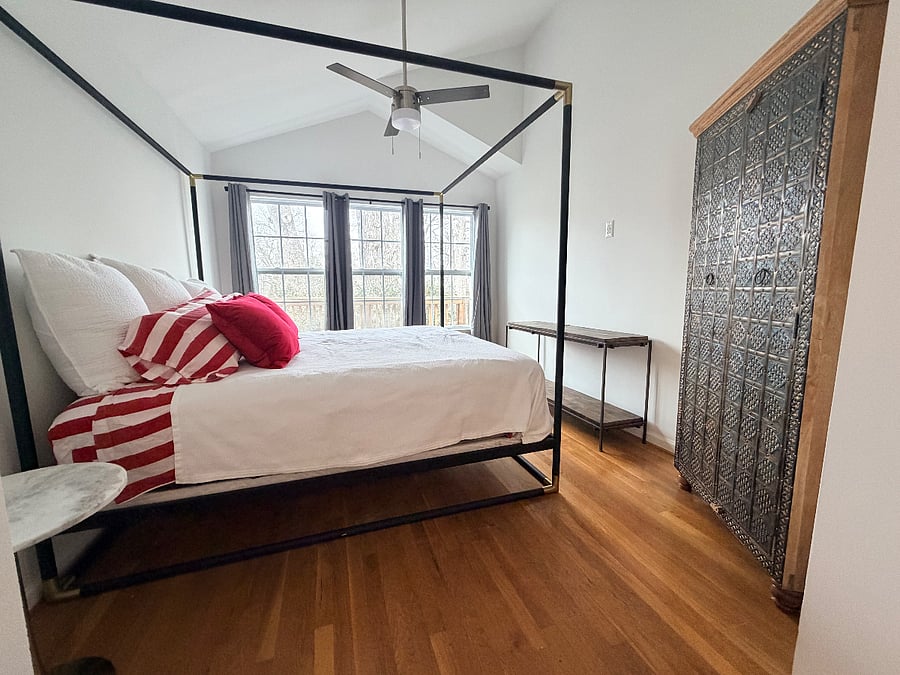 Master bedroom with King Bed and black-out curtains