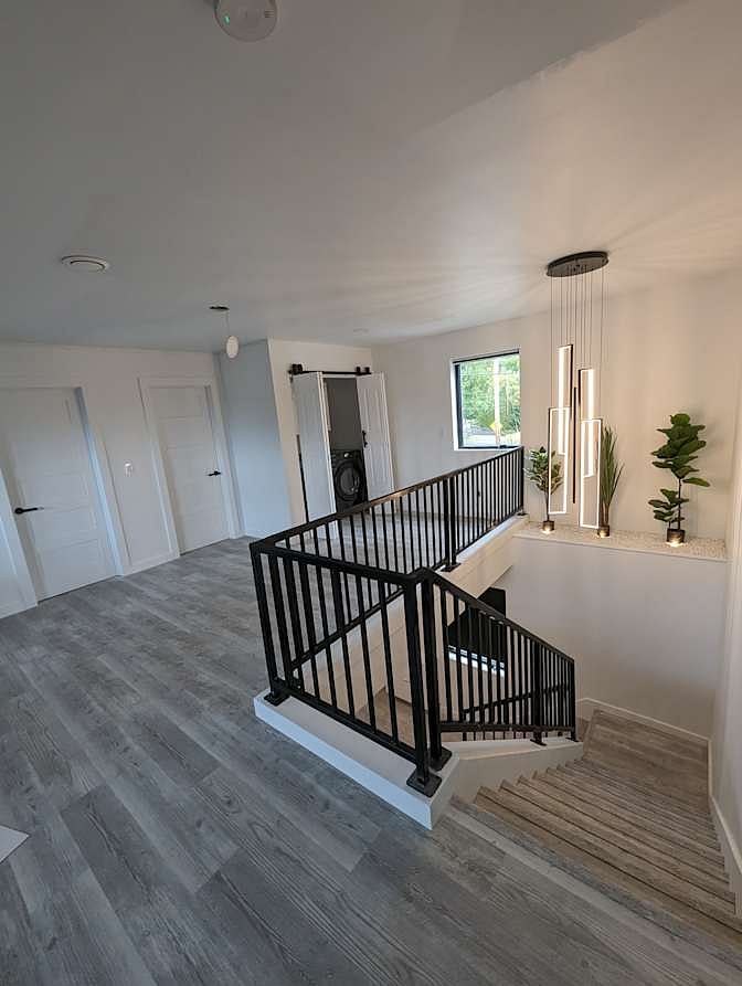 Suite entrance is on the 2nd floor (left door shown)