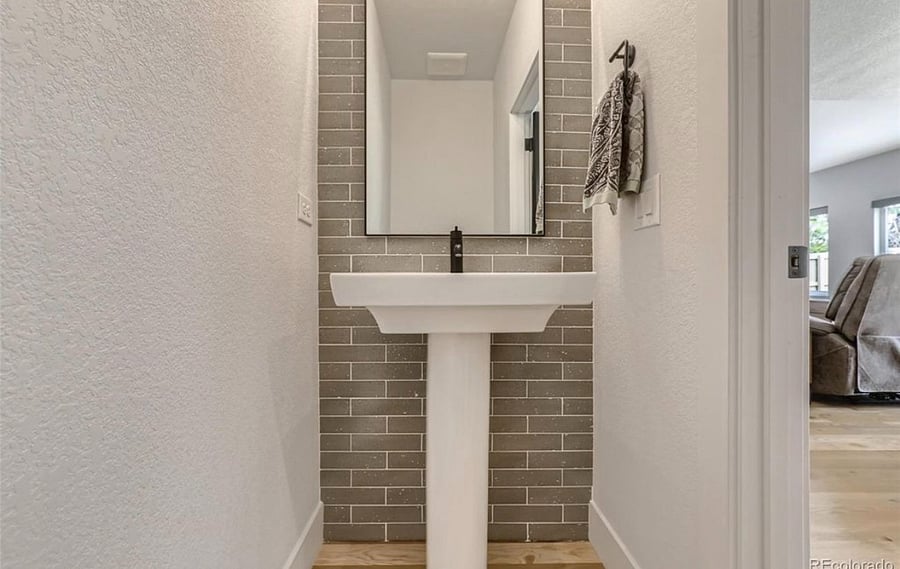 Powder room on first floor off of kitchen