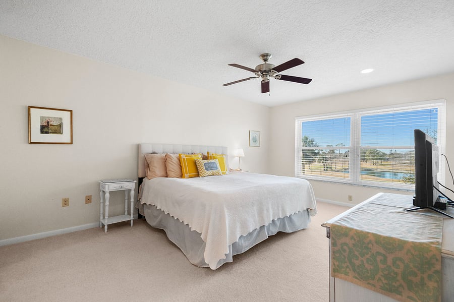 Huge main bedroom with king-size bed.