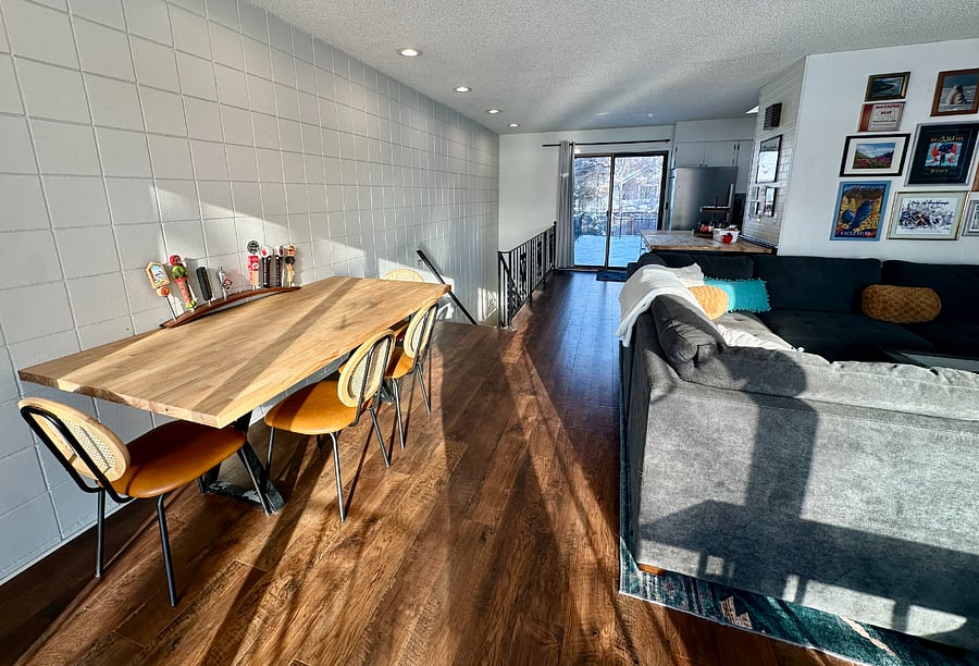 Butcherblock dining table with seating for four.
