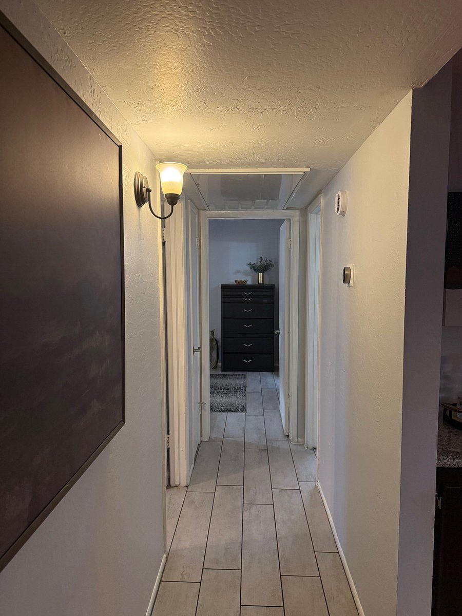 Hallway to Bedrooms and Bath. 