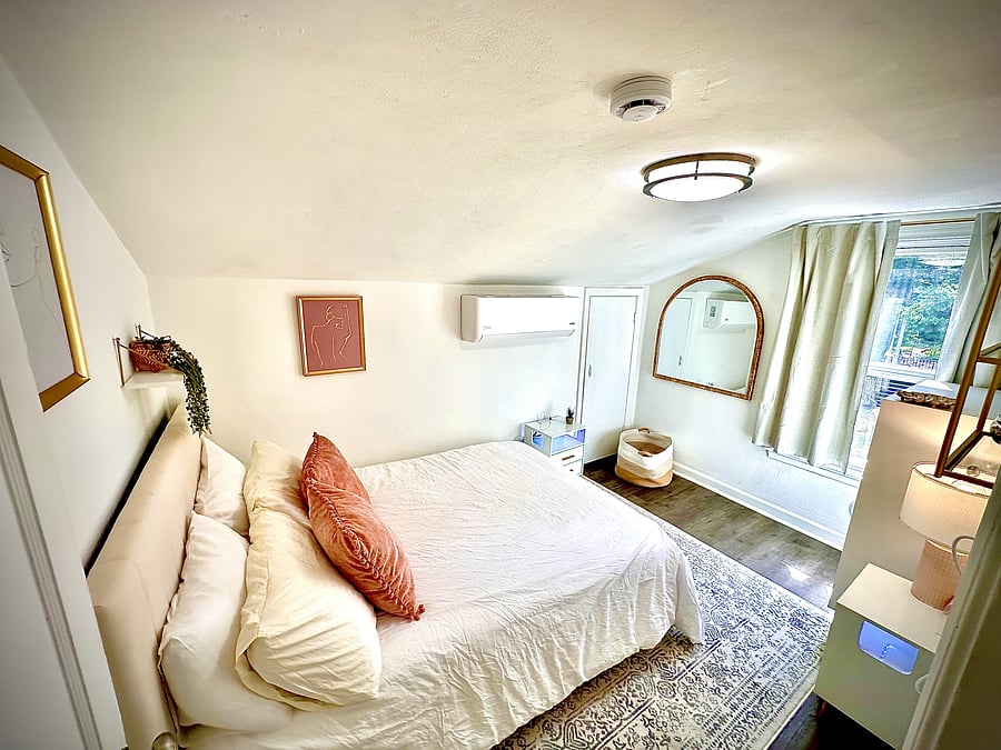 Bedroom 2 - Additional view showing the comfortable sleeping area and generous dresser/storage space for longer stays.