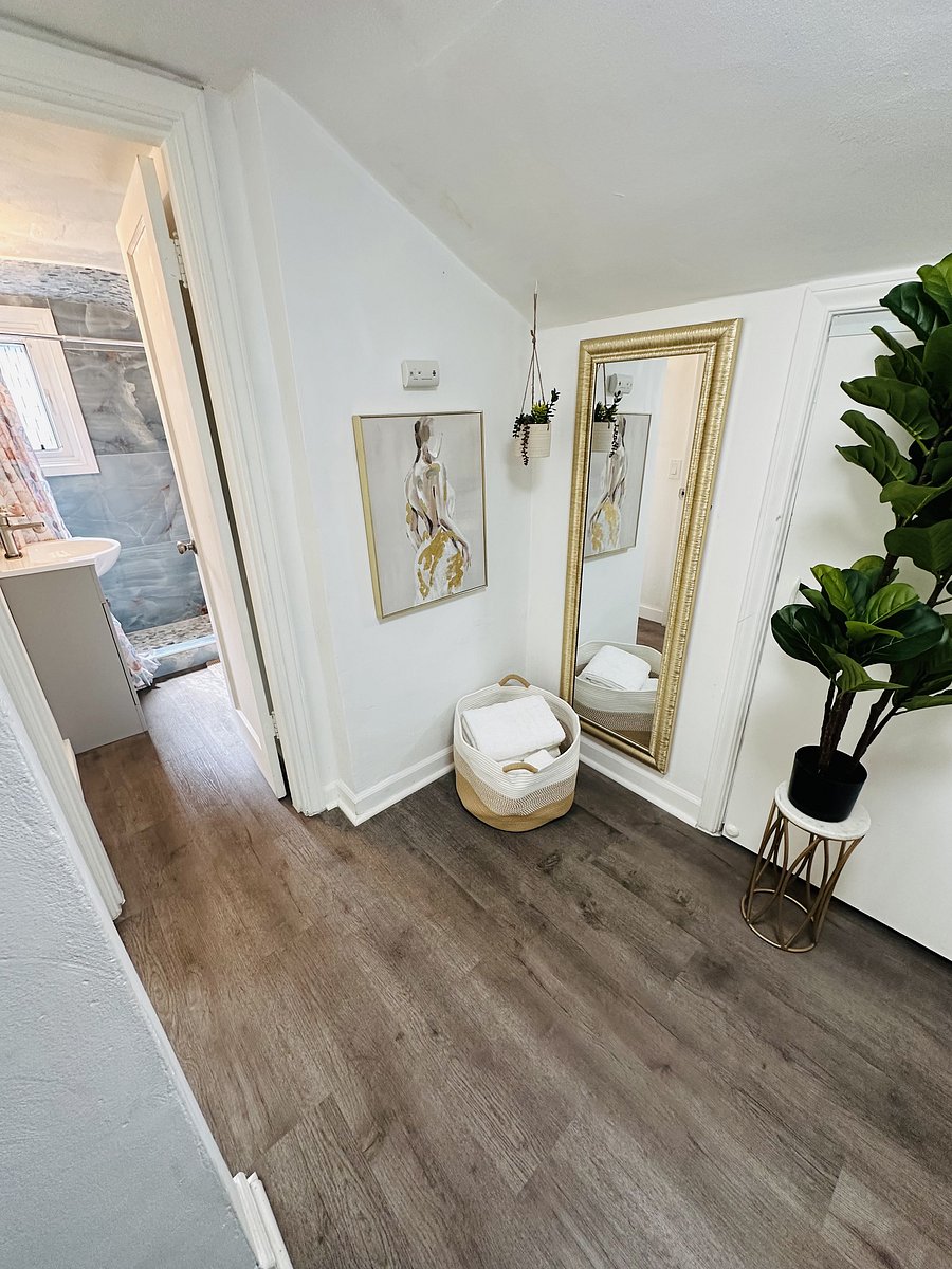 Upstairs Hallway - Convenient access from both private bedrooms to the shared upstairs bathroom, with a clean and welcoming hallway area.