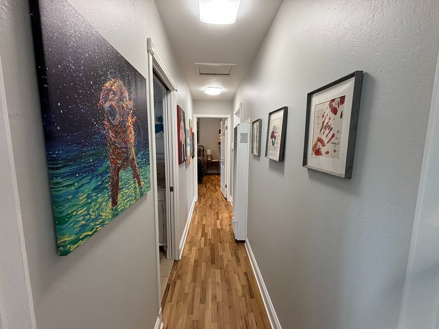 Hallway from Primary bedroom toward secondary bedroom