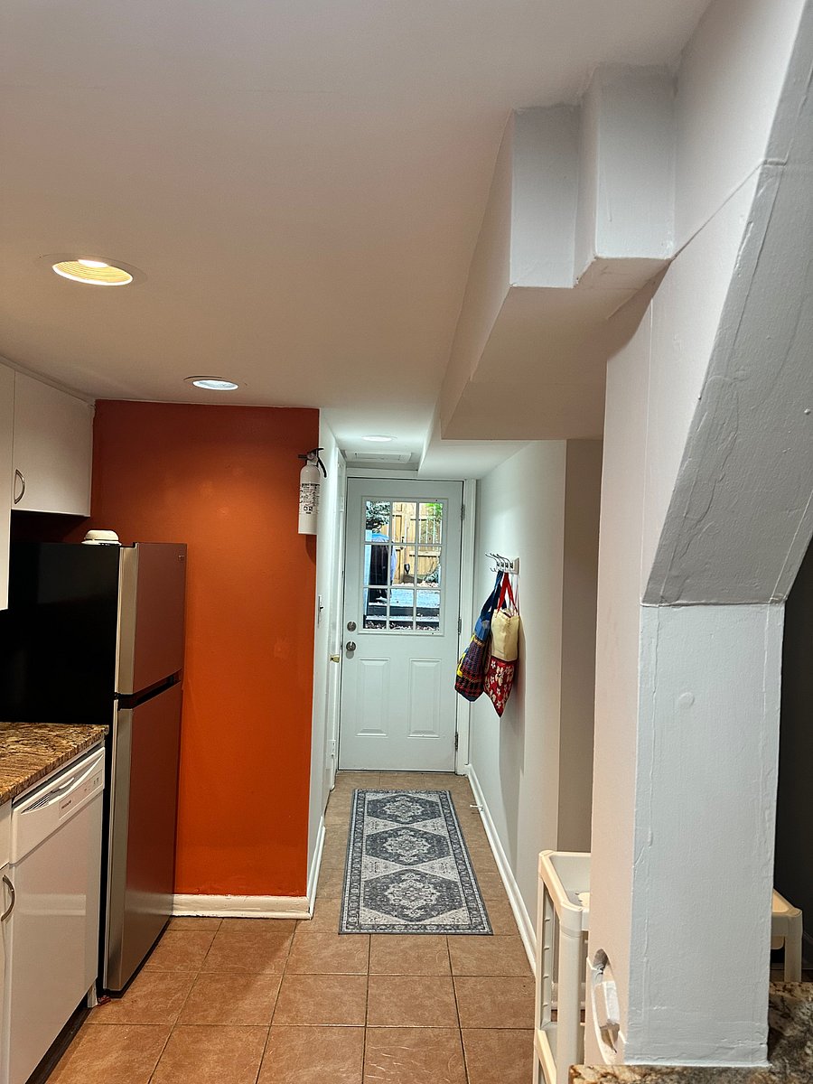 Private entry via shared patio. 