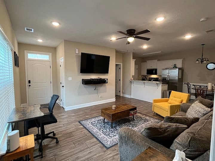 Living Room space with small desk (printer is available if needed)
