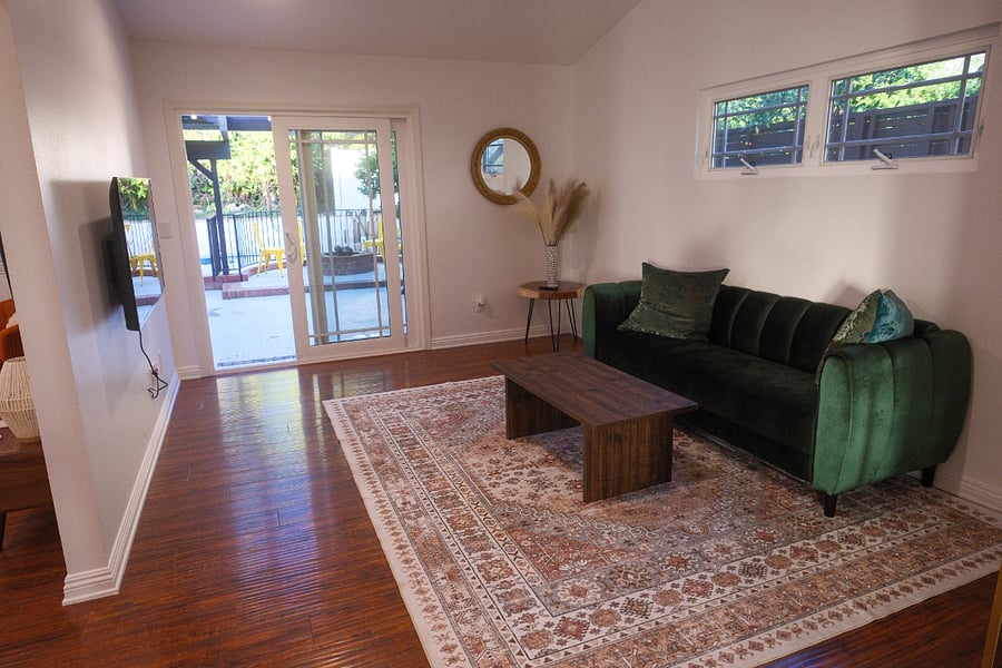 Family room with smart TV and work area
