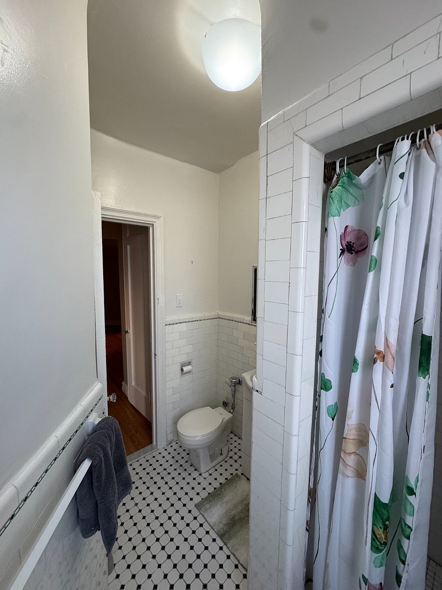 Bathroom including shower shared with one other roommate