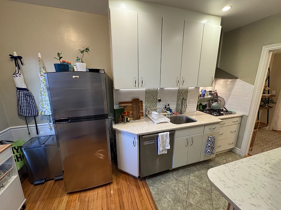 Shared kitchen includes full size refrigerator (shared with one other roommate), gas range, and combo convection and microwave oven.
