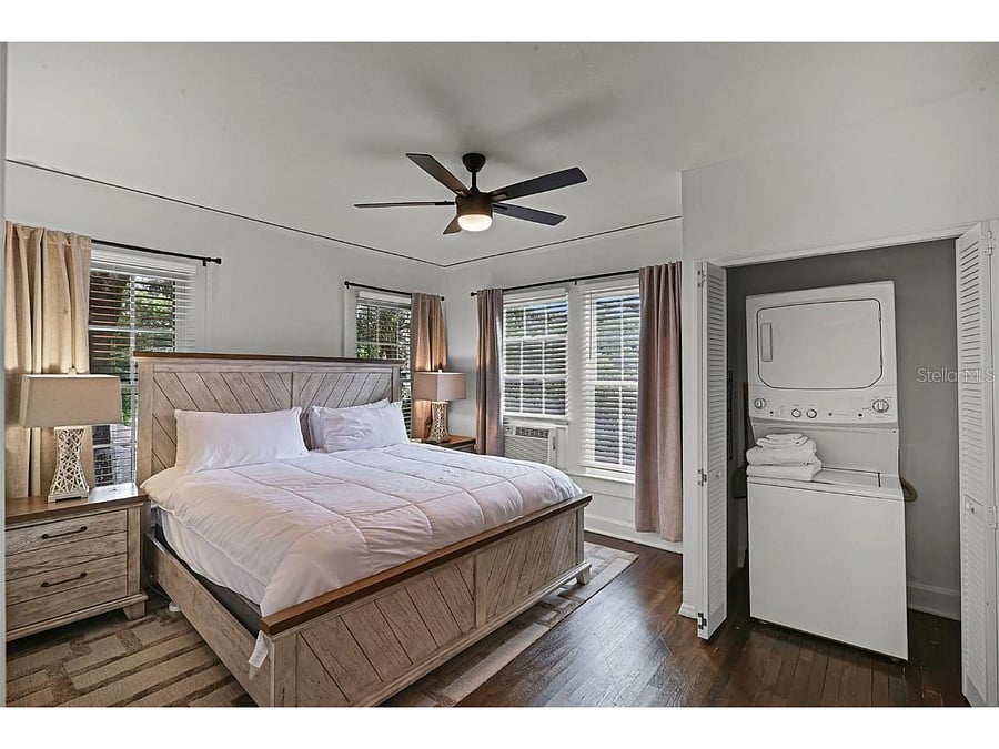 Primary bedroom with washer and dryer