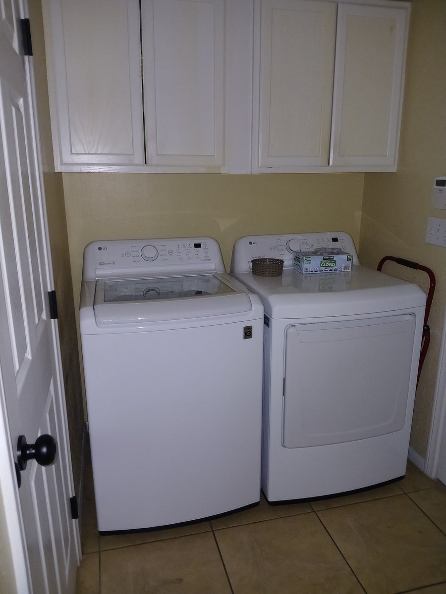 Washer/dryer off kitchen 