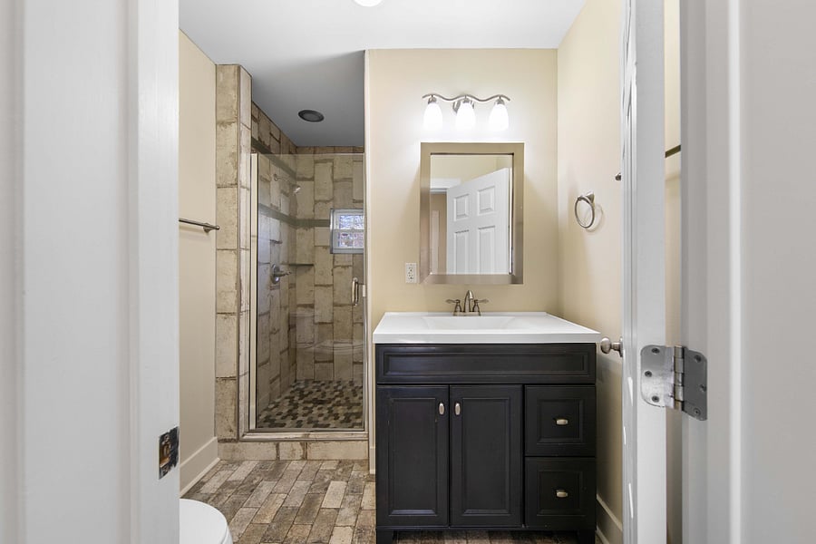 bathroom with step in shower