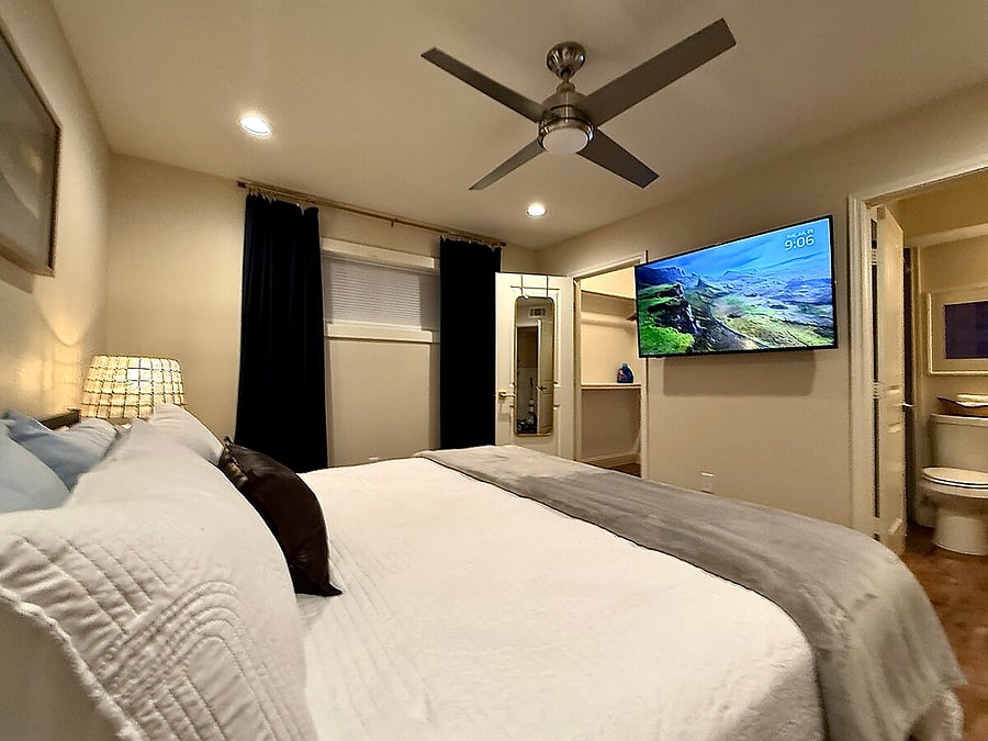 Stream your favorites with a large Smart TV, ceiling fan, and king bed for a restful night.