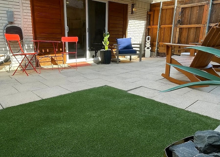 Private backyard oasis with rocking chairs, BBQ, bistro set, smart-lock entry, turf for the pup and reserved parking right outside gate.