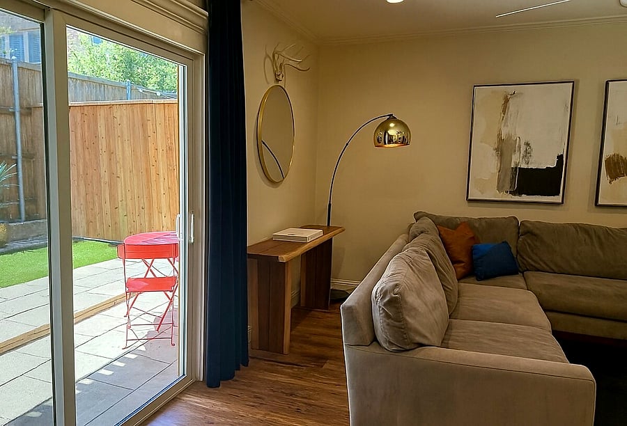 Bright and inviting living room with easy patio access.