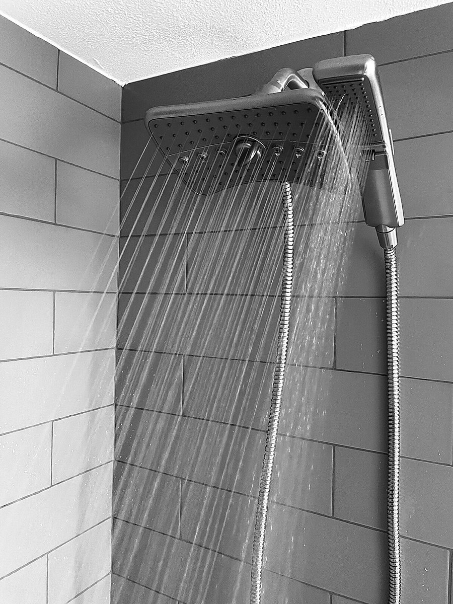 Luxury 2.5GPM rainfall shower with handheld and full soaking tub, Ahhhmazing after a long day