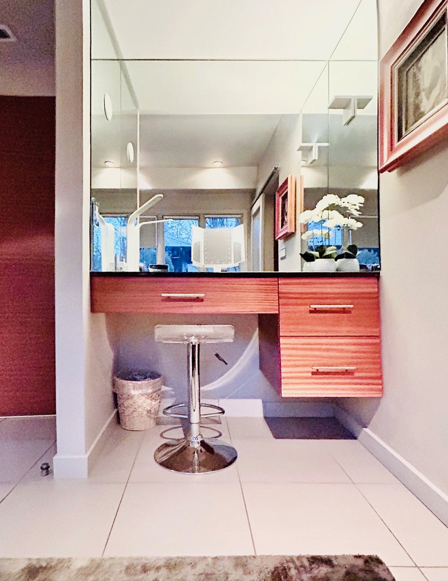 2nd desk for work station or can be used as a vanity area right outside the bathroom.