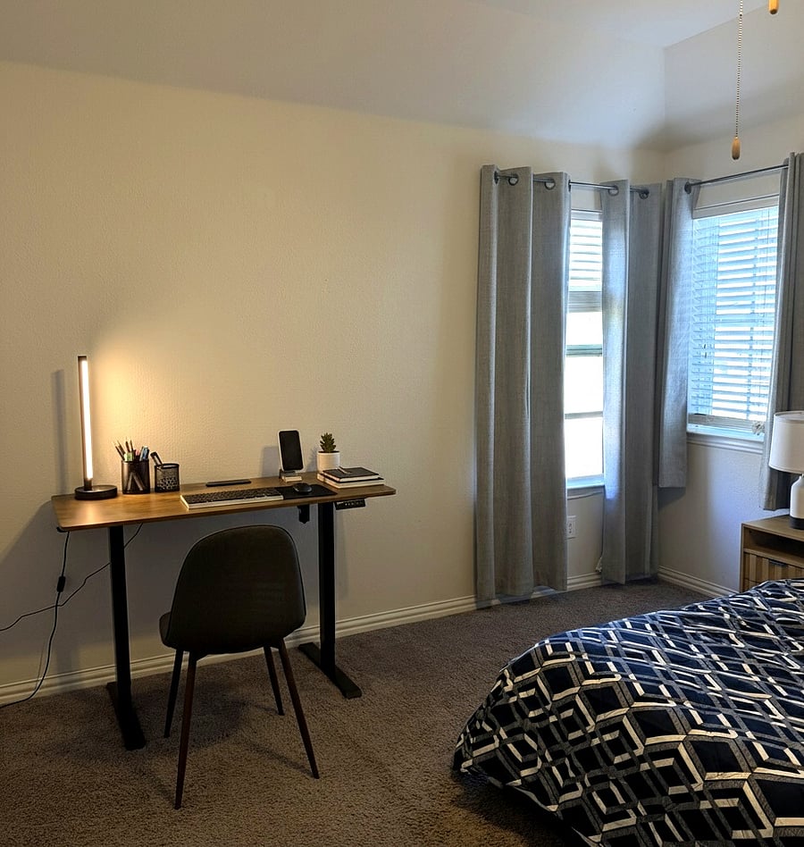 Adjustable standing desk and work-ready setup; strong Wi-Fi.