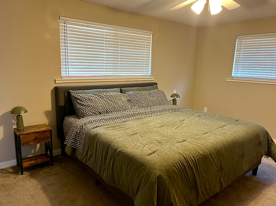Master bedroom with new king mattress, smart tv and connecting bathroom