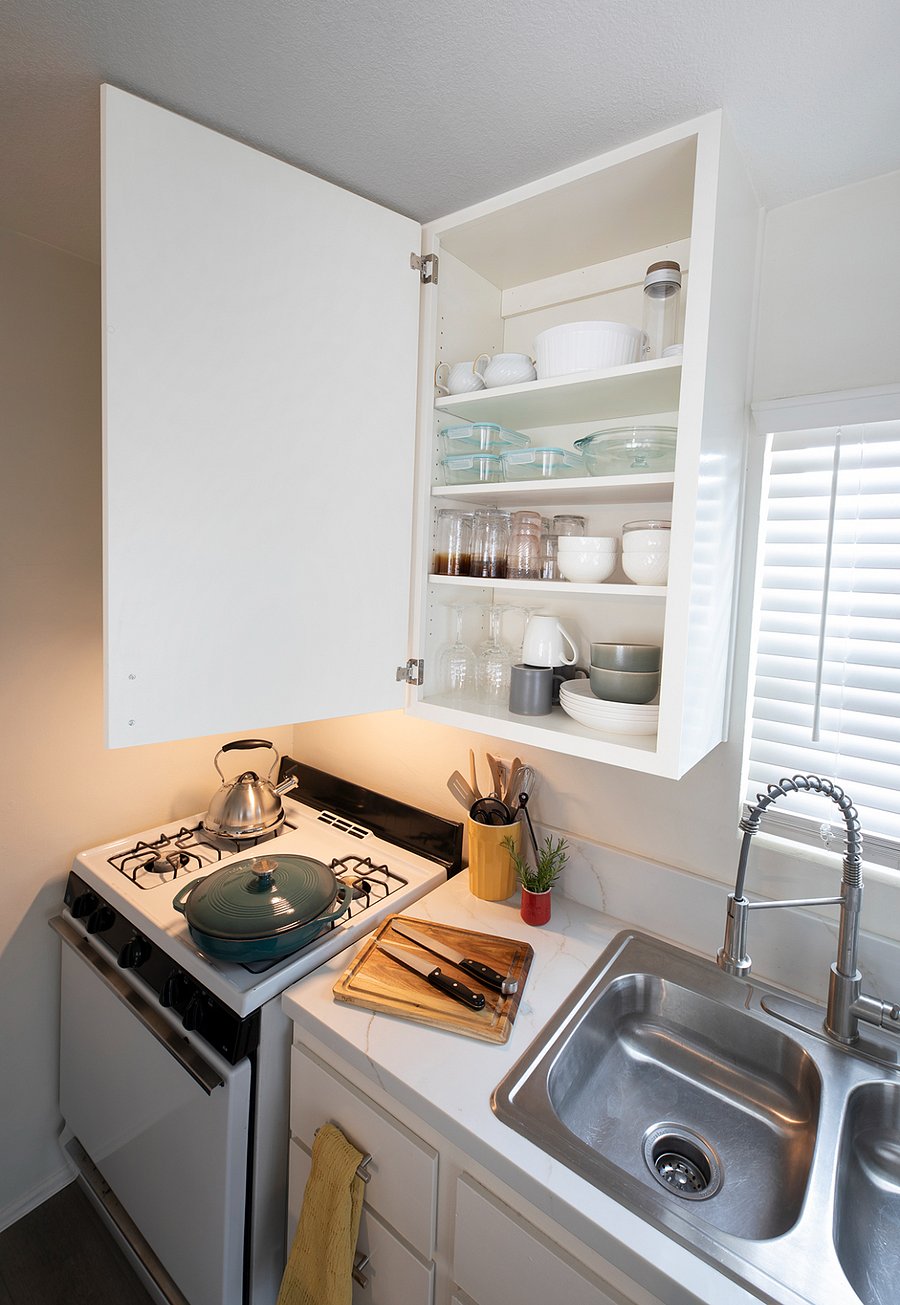 fully appointed kitchen with dishes, glassware, cutlery, knives, pots and pans, microwave, air fryer, crock pot, blender, etc