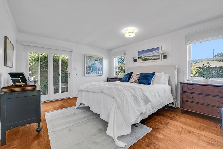 Primary ensuite bedroom with king size bed