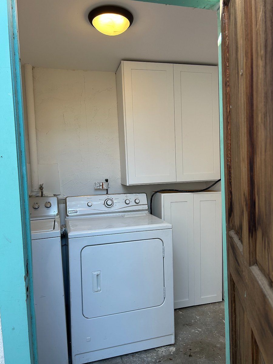 On-site laundry and private storage area for the tenant.