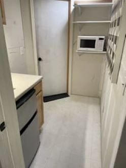 Coffee bar area w/mini fridge, microwave & Keurig coffee maker 