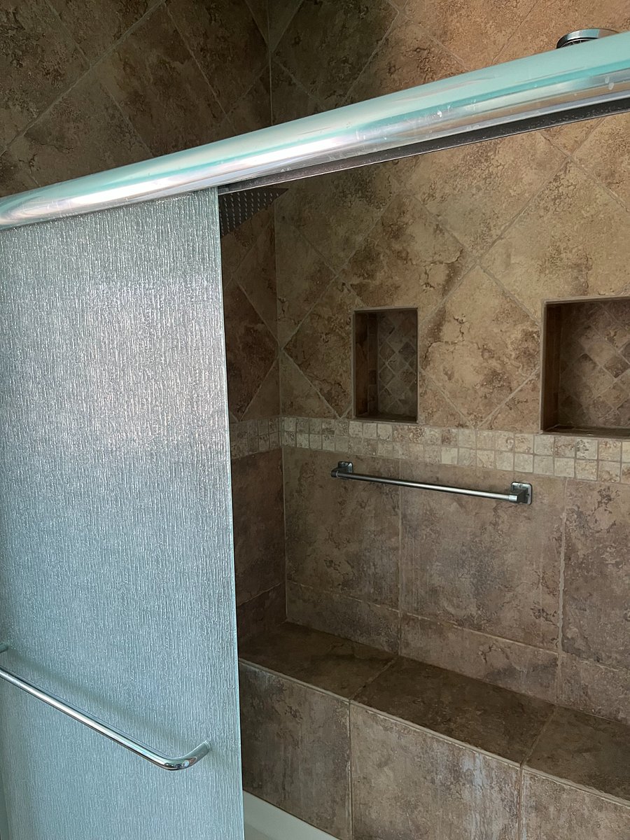 Walk in Rain Shower with seating and rail safety