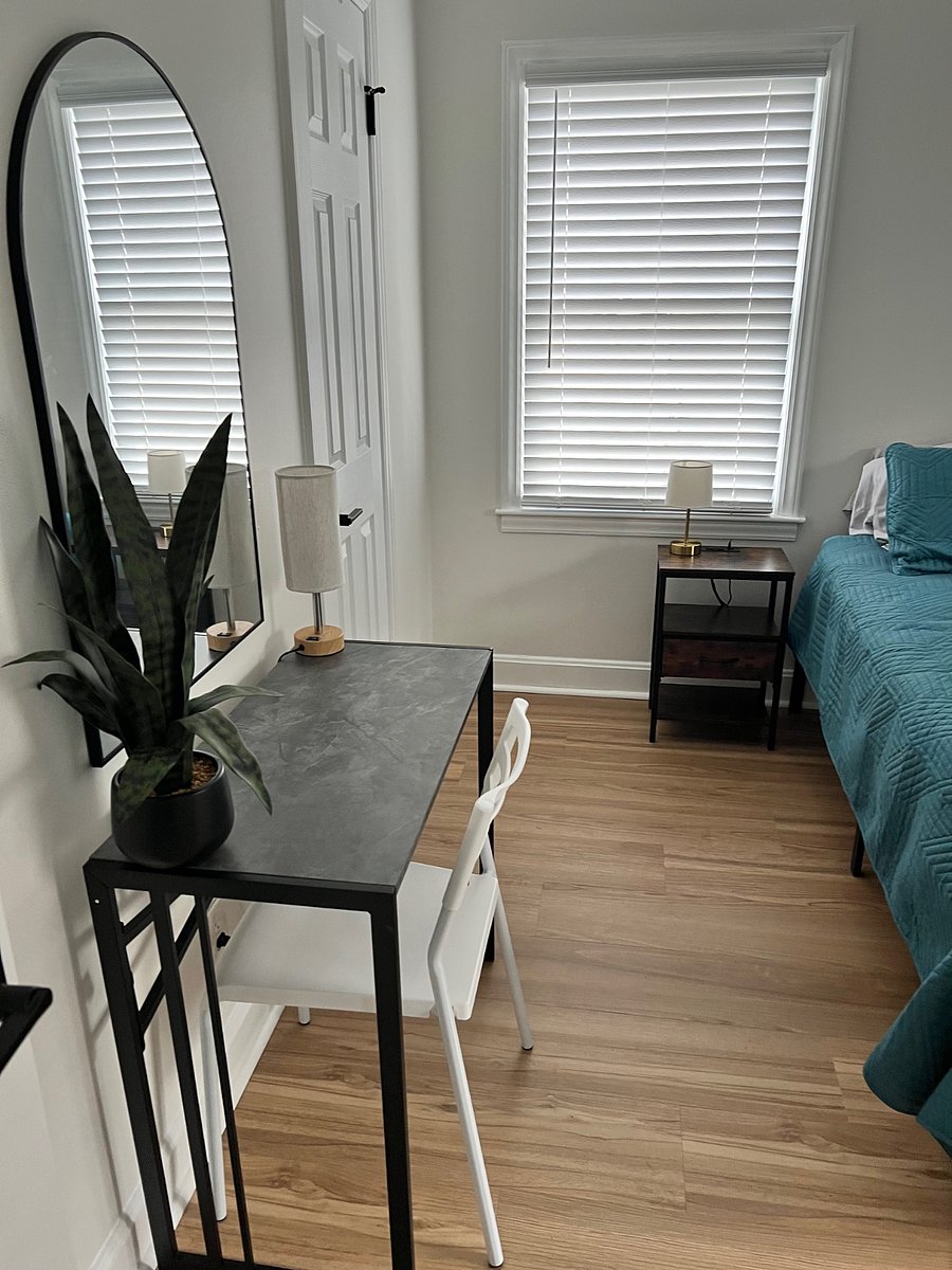 Desk area in bedroom for computer or makeup.