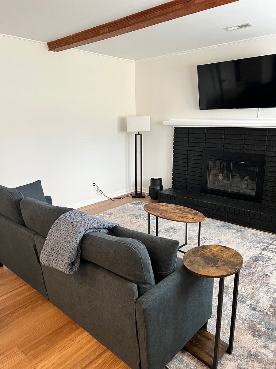 Living room with smart TV and couch.