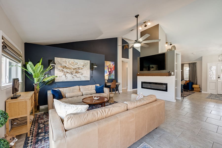 Leather Sofas, dual sided fireplace and views to front living
