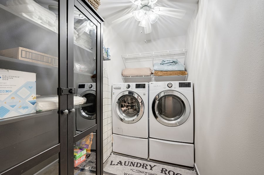 Laundry room The dedicated laundry room features LG Steam Washer and Dryer on pedestals. Full size ironing board.