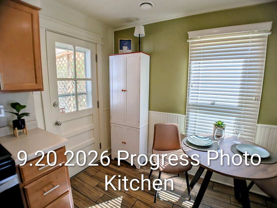 Kitchen - pantry, table and chairs. Artwork coming soon!
