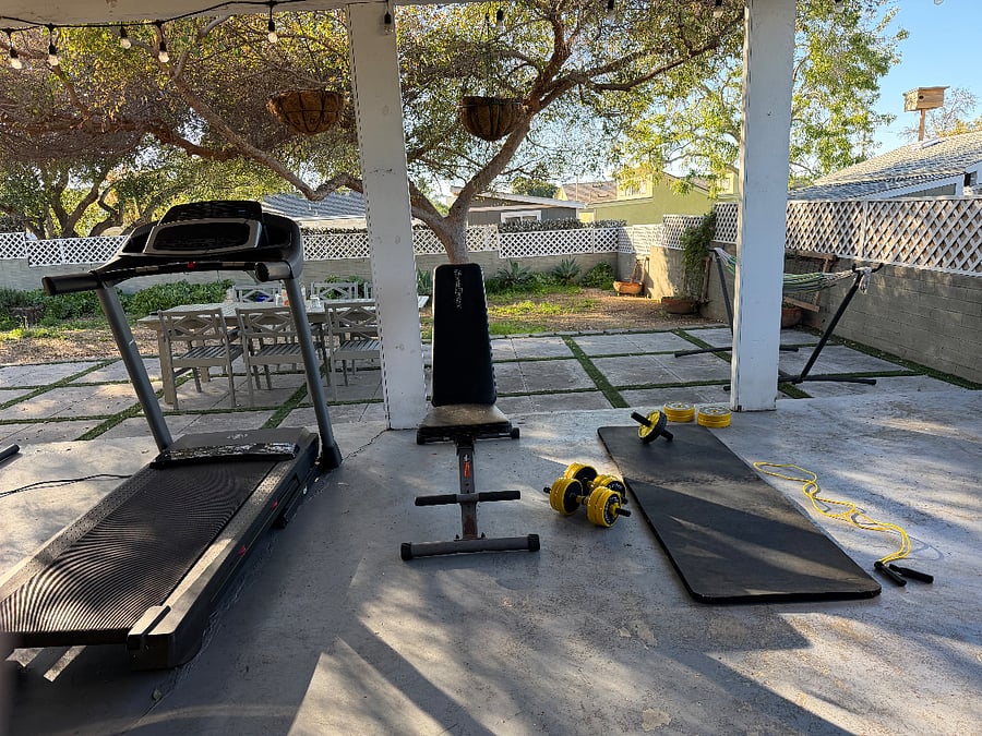 Available exercise equipment - treadmill, bench, free weights, jump rope