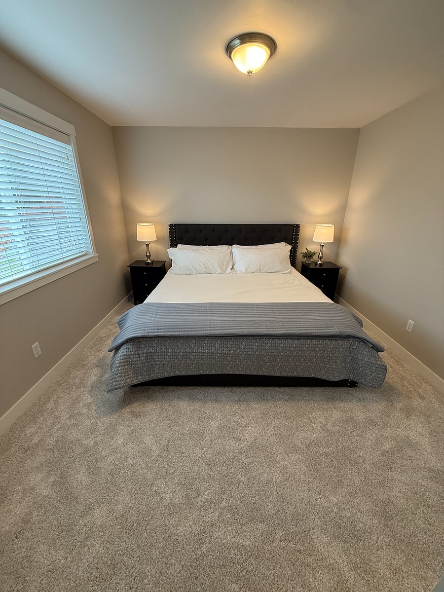 Bedroom 2: King bed on the north side of home.