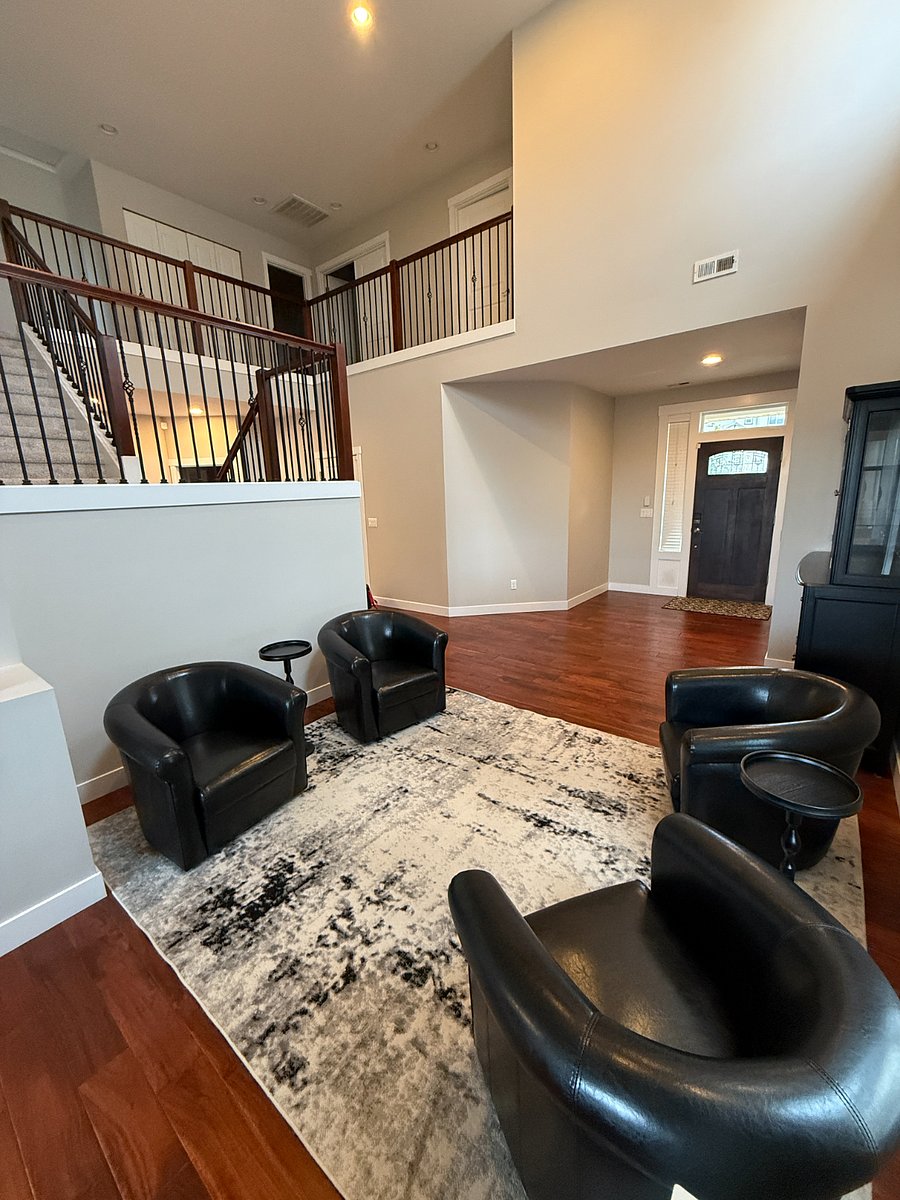 Formal living room with room to relax or converse.