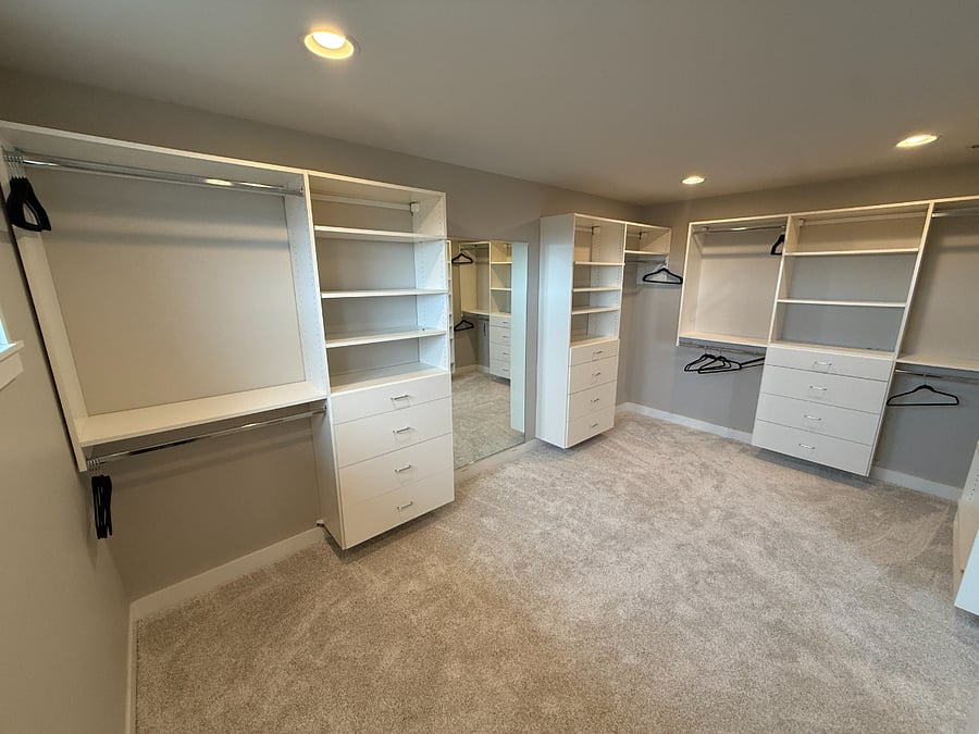 Large primary walk-in closet.