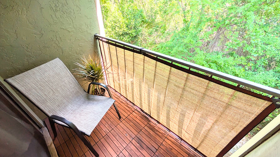 Balcony off bedroom. Protective screen added for pets.