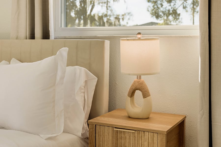 Unwind in comfort: Soft lighting and neutral tones create the perfect atmosphere for relaxation.