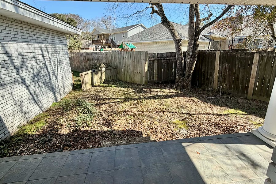 Separate back porch and fenced in area,so that pets can use the restroom separate from the rest of the yard. 