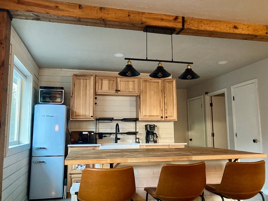 Beautiful natural light and seating for 3 at the gracious island.