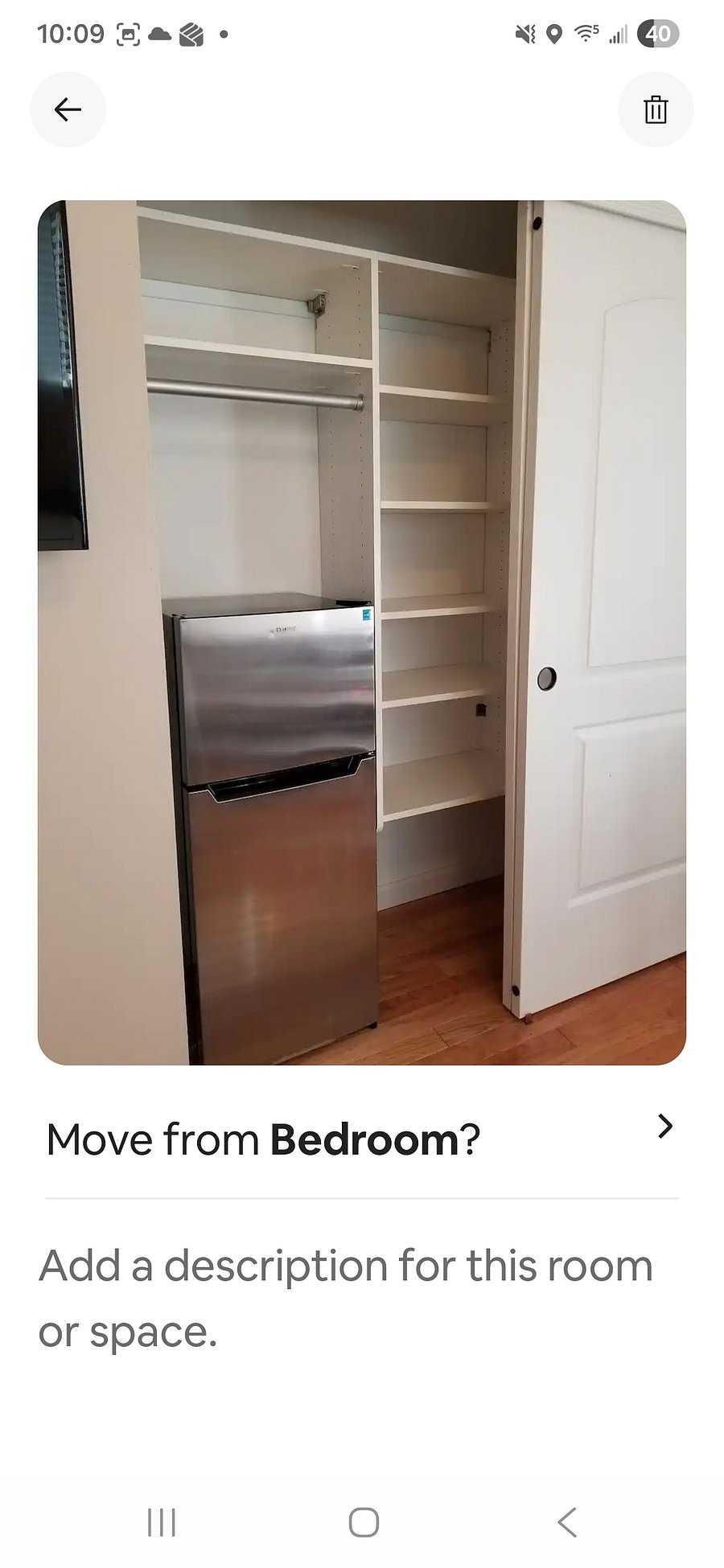 Bedroom closet with your own mini fridge/freezer. 
