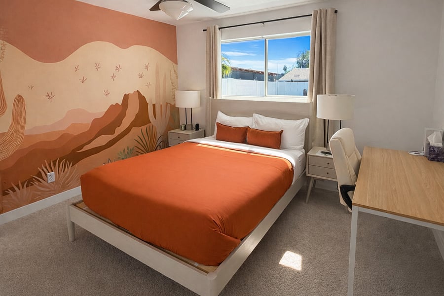 Comfortable primary suite with premium bedding, ensuite bathroom and ample natural light.